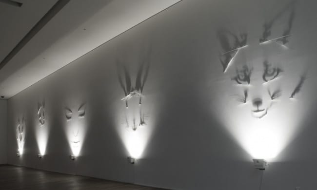 Художник, рисующий тенью