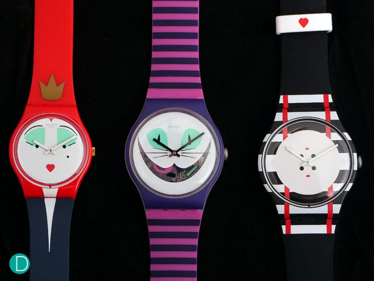 Часы с алисой. Swatch Чеширский кот. Часы свотч Снупи. Часы свотч Чеширский кот. Часы Swatch Чеширский кот.